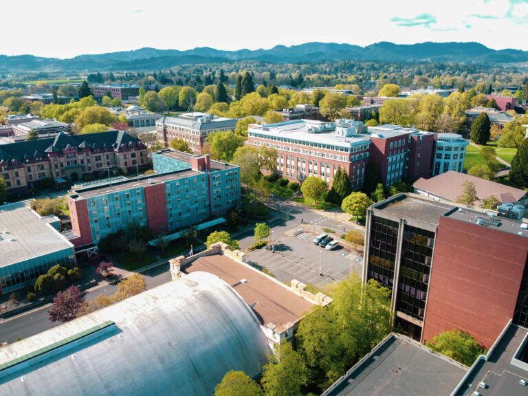 Aerial view of a college campus with brick residence halls