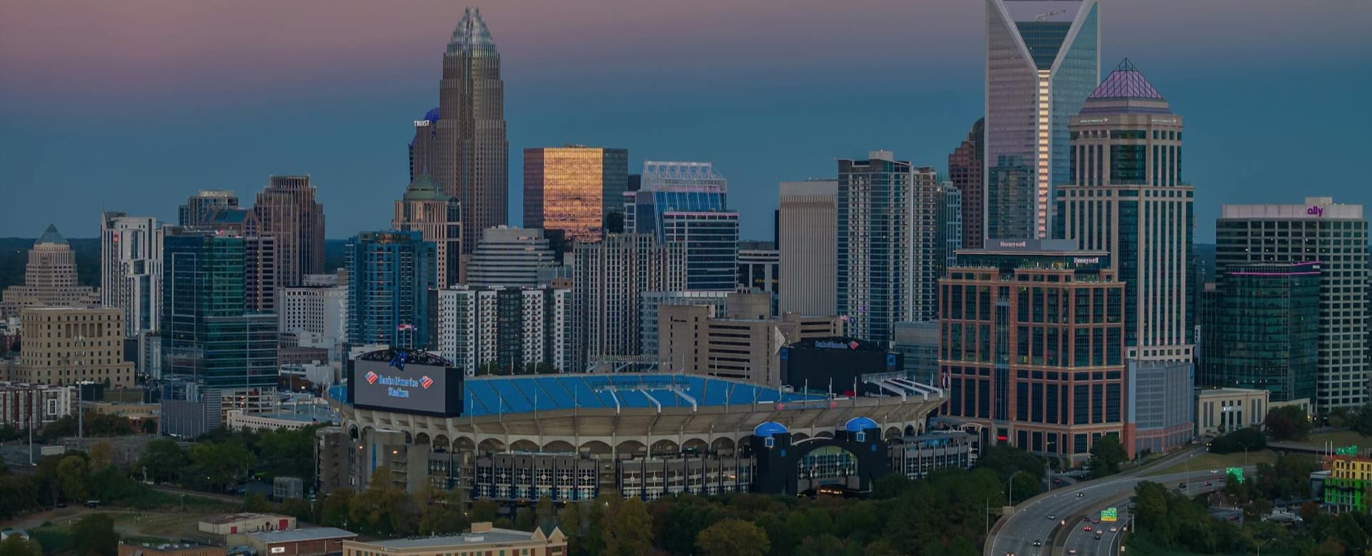 Charlotte skyline at dusk, the busiest delivery city on the New York to North Carolina lane